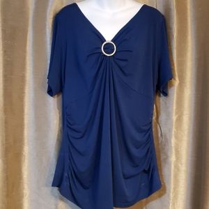Navy blue top with low plunging neckline